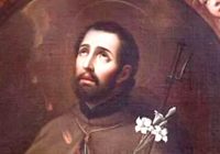 el santo con una azucena